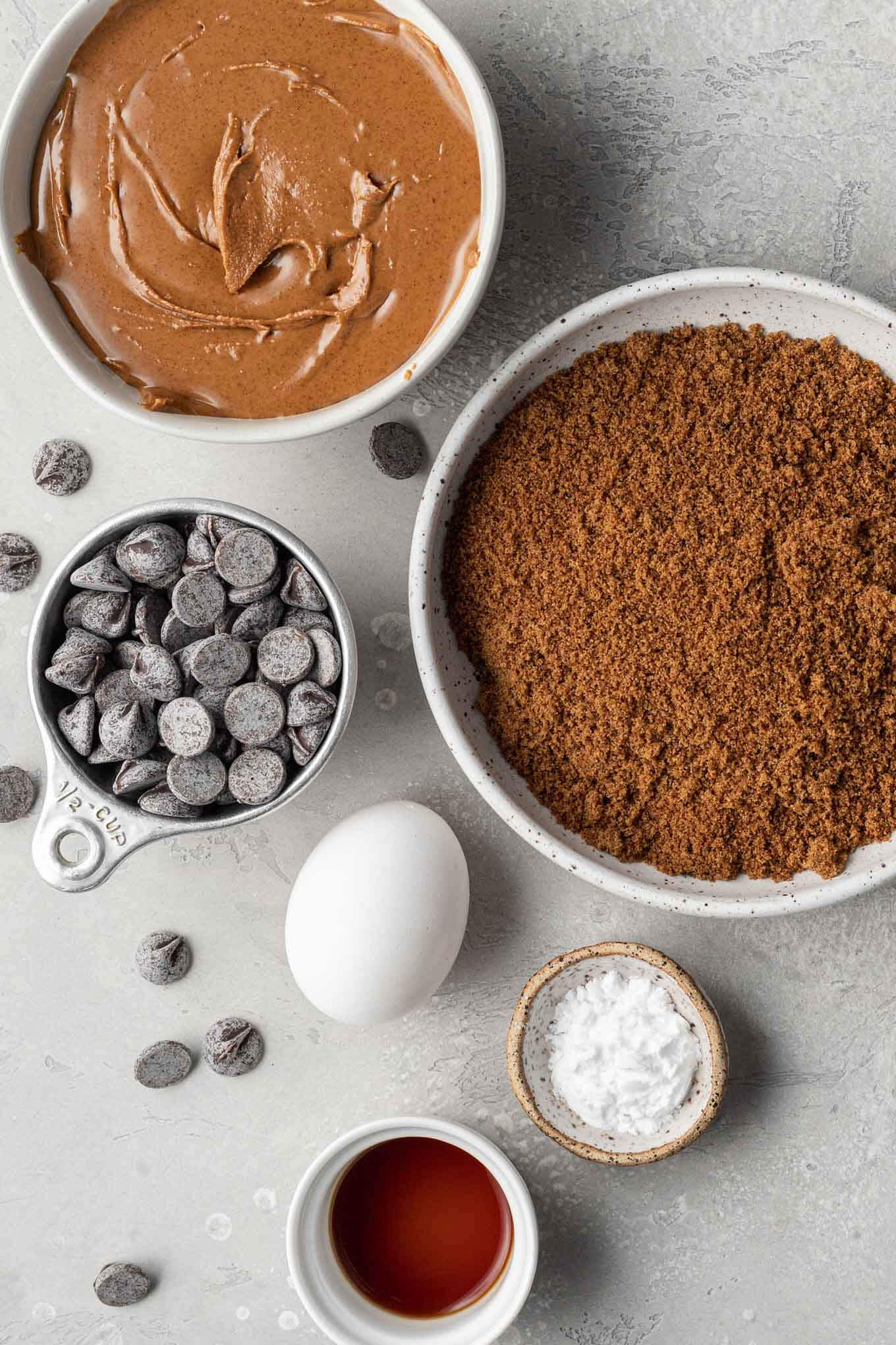 An overhead view of the ingredients needed to make almond butter chocolate chip cookies. 