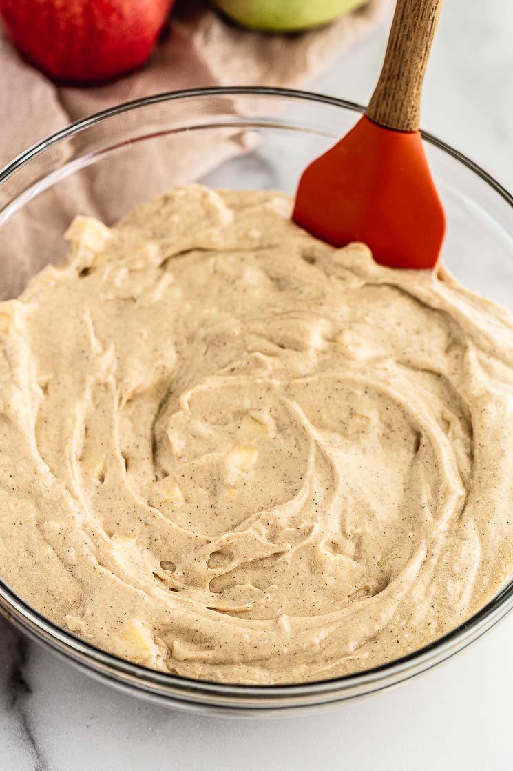 A picture of muffin batter inside of a glass bowl.