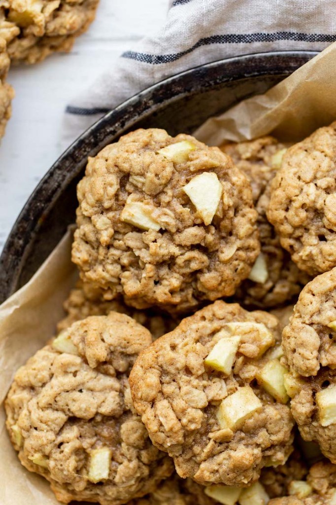 A close up image of cookies in an antique metal baking dish.