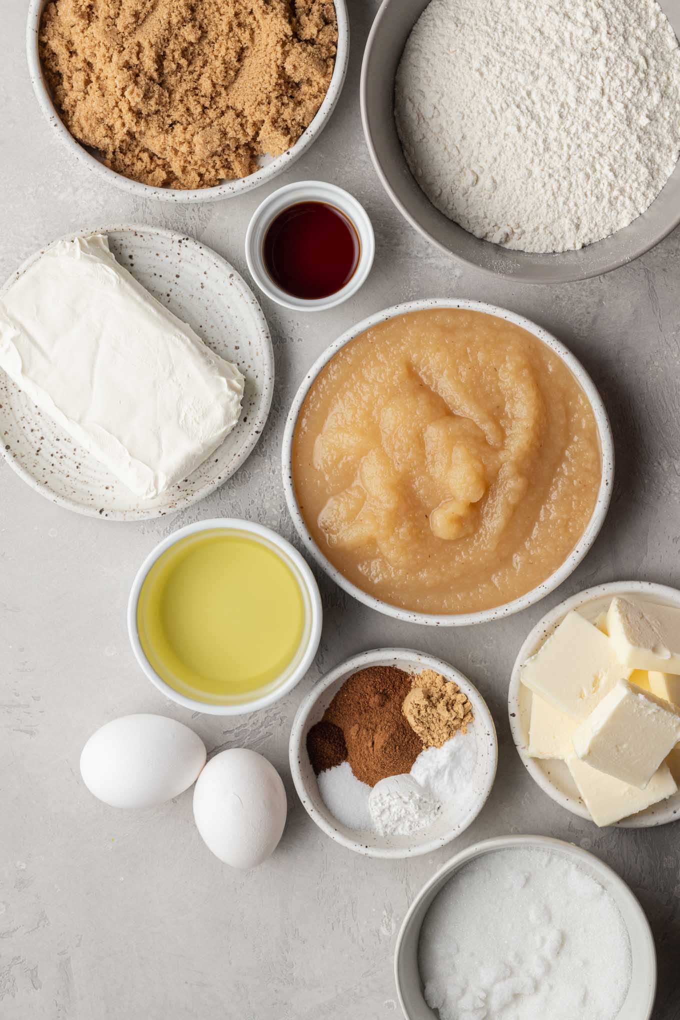 An overhead view of the ingredients needed to make spiced applesauce cake. 