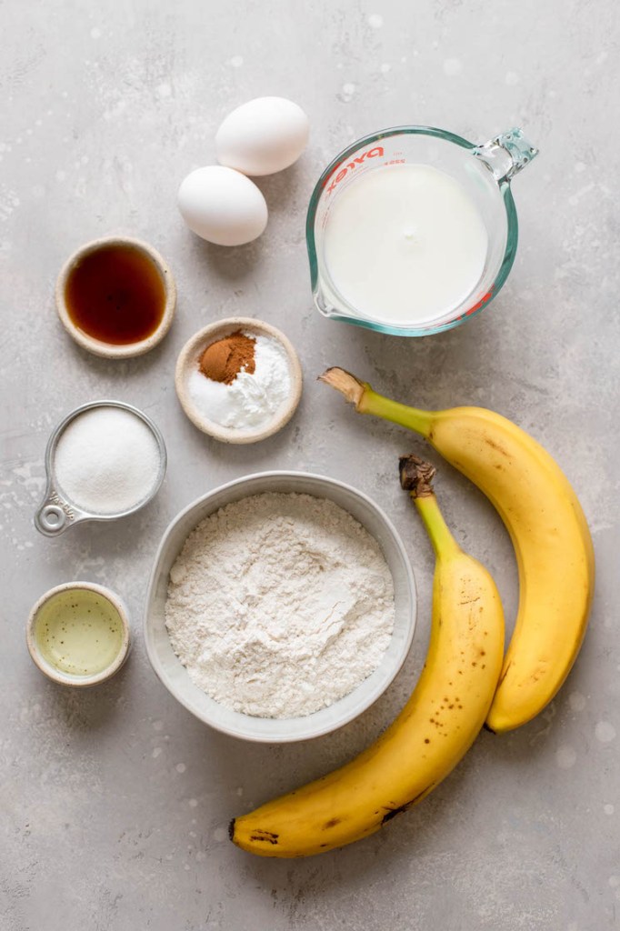 Overhead view of the ingredients needed to make homemade banana pancakes. 