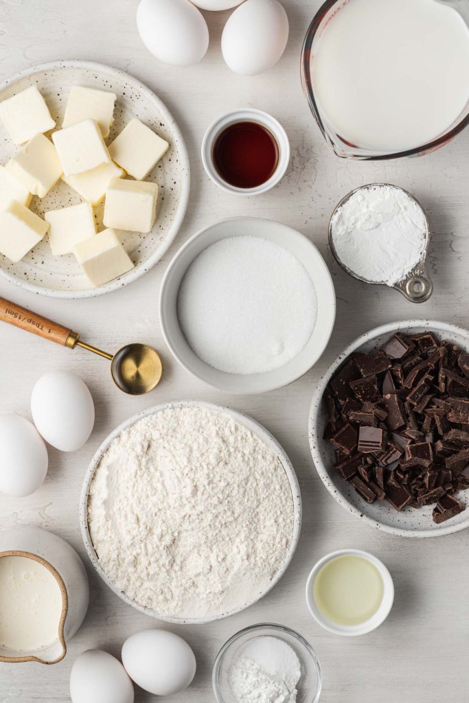 An overhead view of the ingredients in a Boston cream pie cake. 