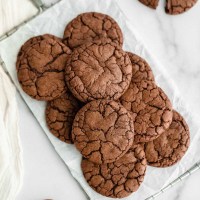 Brownie cookies on top of an antique safety grater.