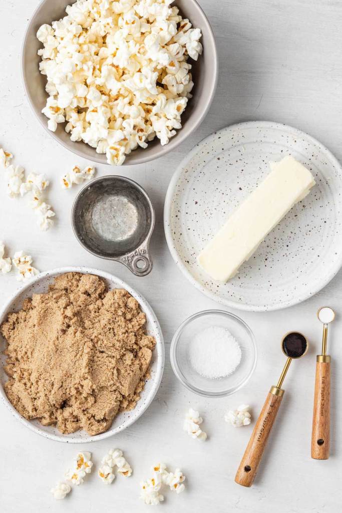 An overhead view of the ingredients needed to make the best homemade caramel popcorn. 