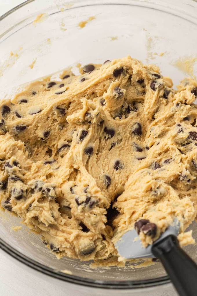 An overhead view of chocolate chip cookie dough made with pudding mix.