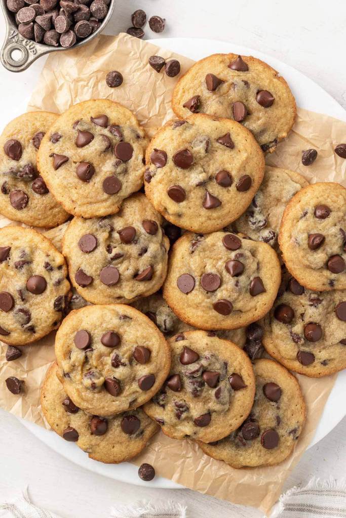 An overhead view of a plate piled high with pudding cookies. 