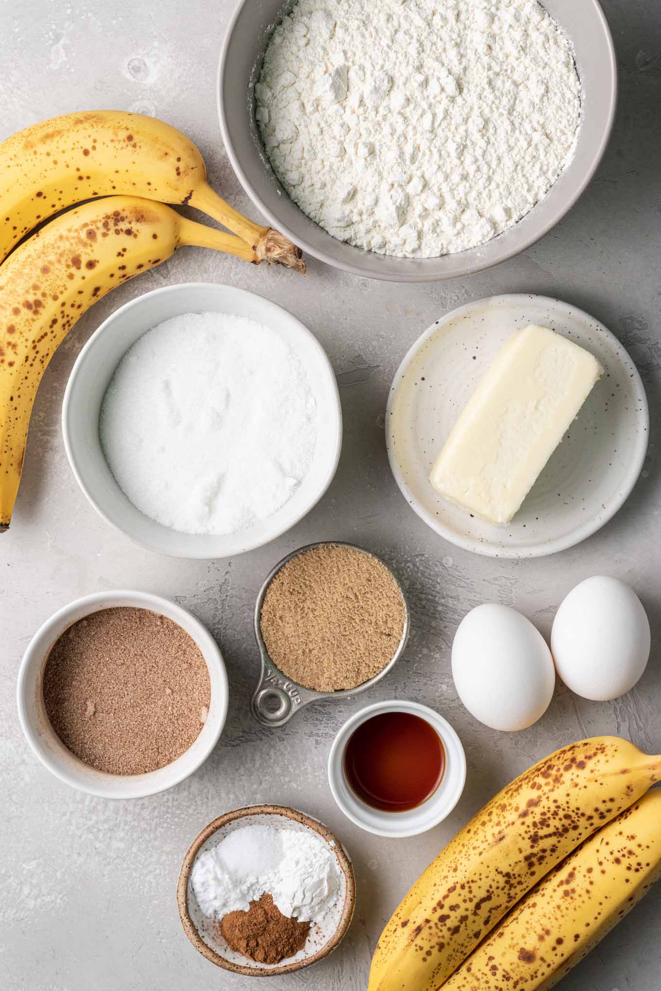 An overhead view of the ingredients needed to make cinnamon banana bread. 