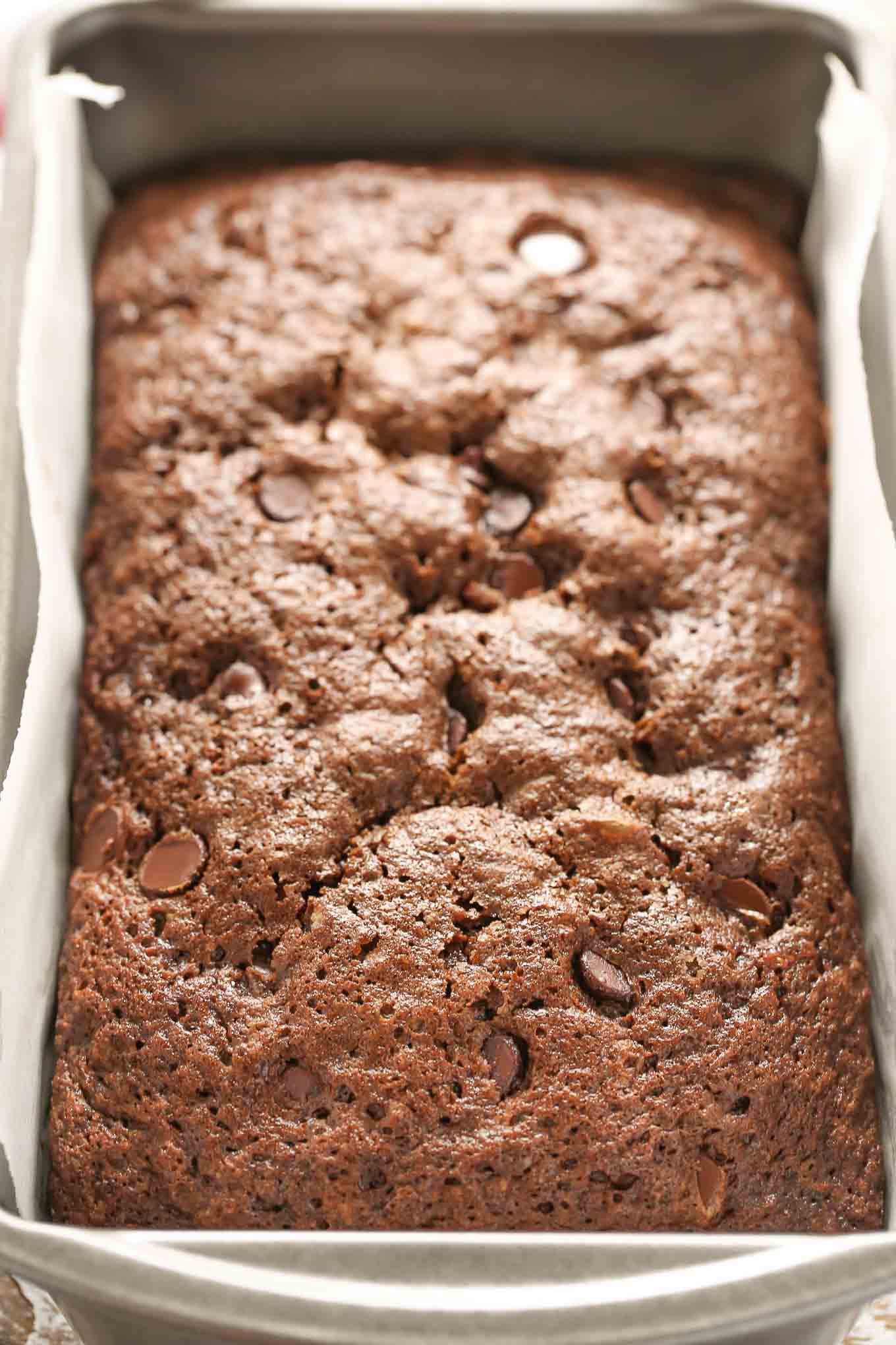 This Double Chocolate Zucchini Bread is incredibly rich, moist, fudgy, and loaded with chocolate chips!