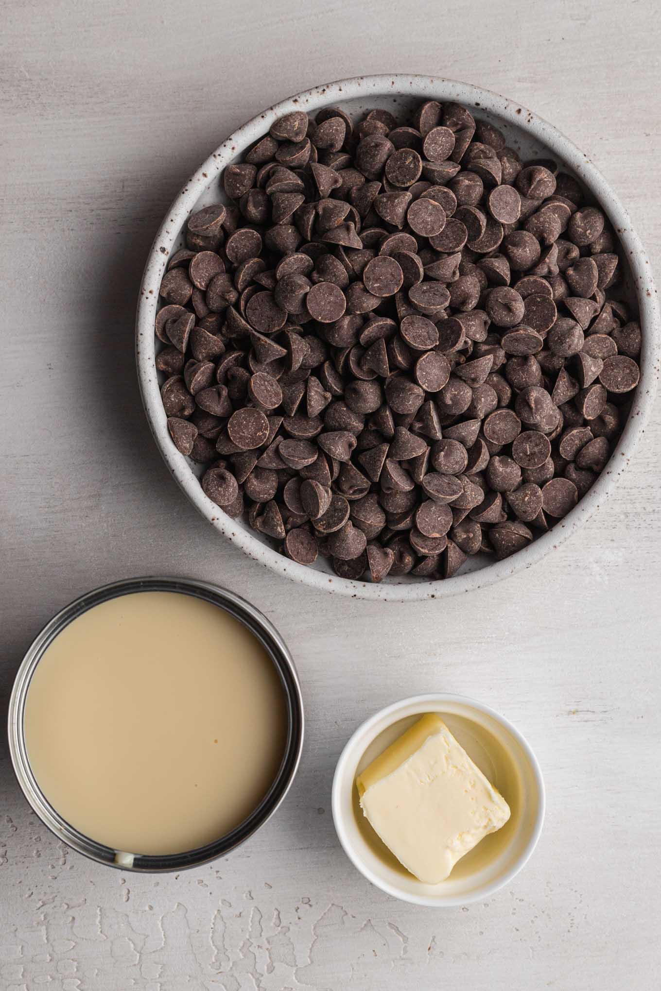 An overhead view of the ingredients needed to make simple chocolate fudge with sweetened condensed milk. 