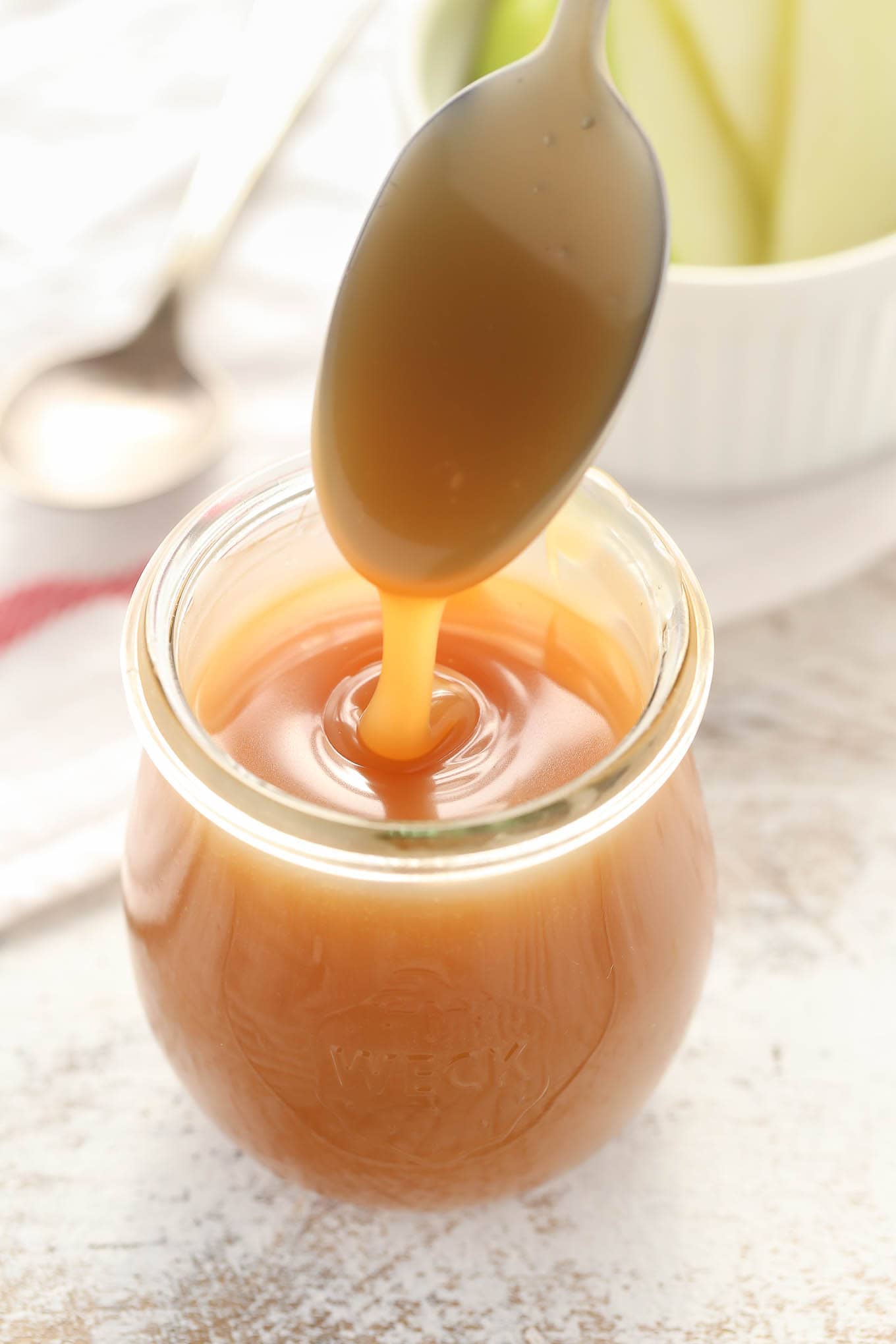 This easy Homemade Salted Caramel Sauce is easy to make and perfect for topping on ice cream or almost any dessert!