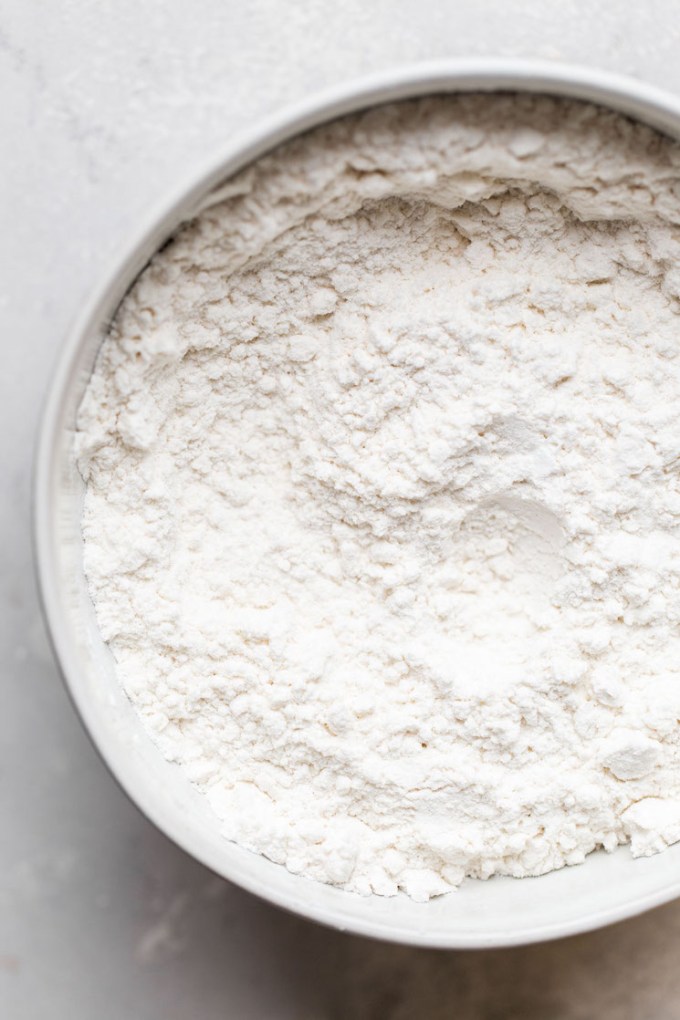 Dry ingredients for muffins in a mixing bowl.