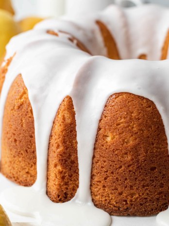 A lemon pound cake topped with lemon icing.