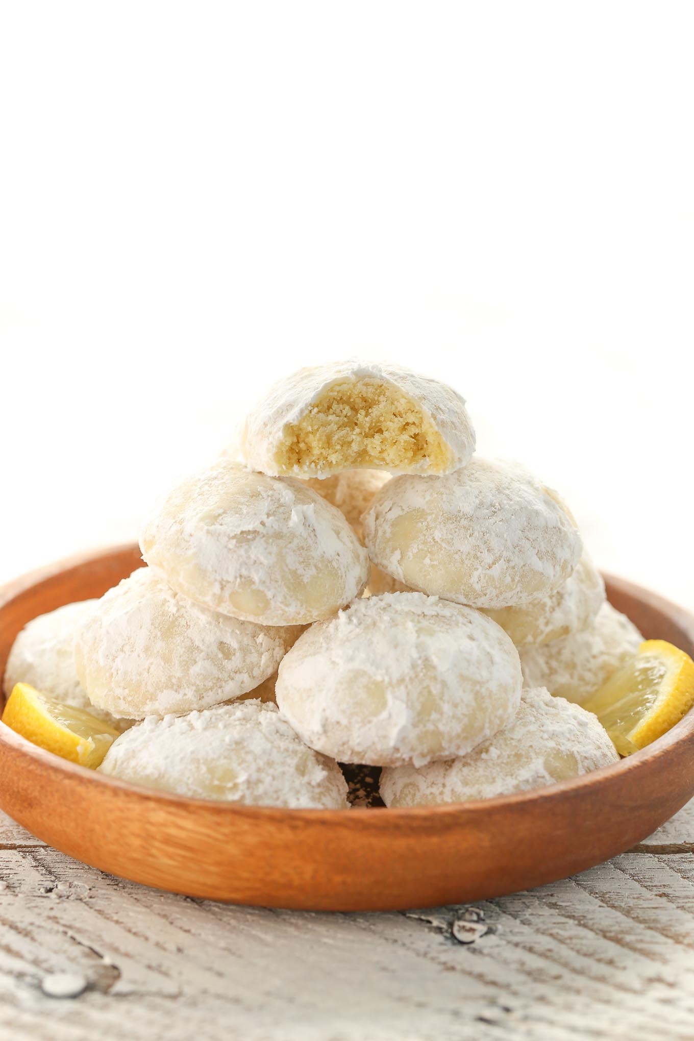 Buttery and tender lemon cookies rolled in powdered sugar. These Lemon Snowball Cookies are so easy to make, incredibly delicious, and they don't require any dough chilling!