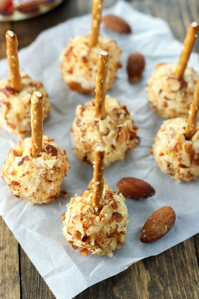 Easy to make mini cheese balls coated in Blue Diamond Smokehouse Almonds. These make a great football or holiday party appetizer!