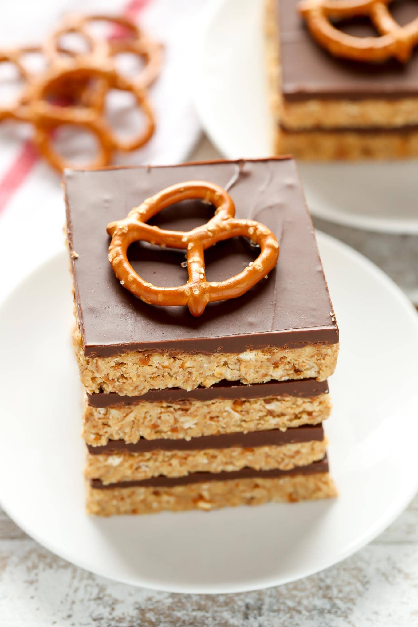 These No-Bake Peanut Butter Pretzel bars are the perfect sweet and salty dessert. You only need five ingredients to make these incredibly easy bars too!