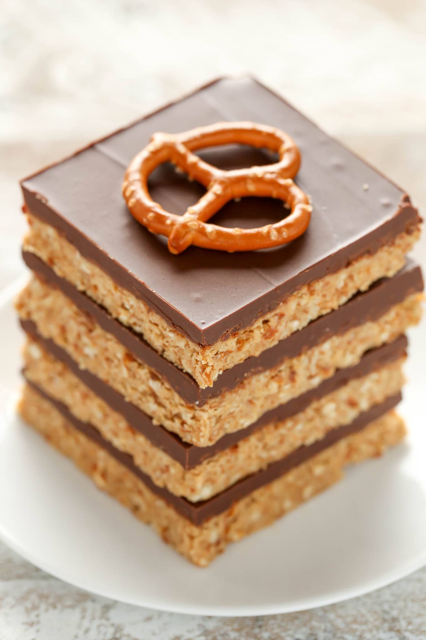 These No-Bake Peanut Butter Pretzel bars are the perfect sweet and salty dessert. You only need five ingredients to make these incredibly easy bars too!