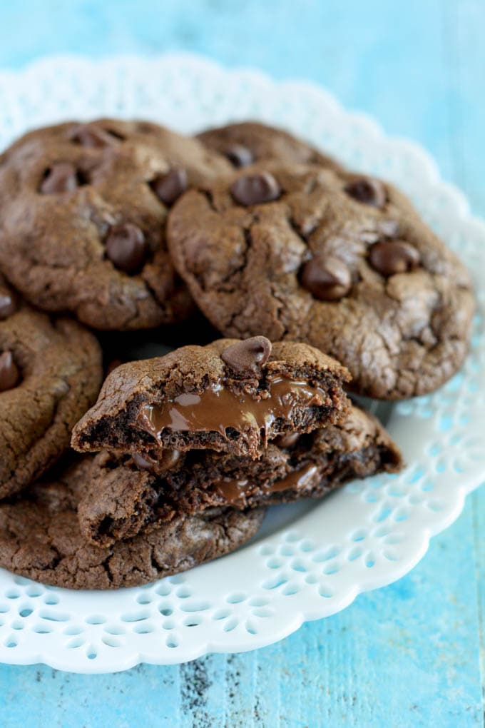 Pile of Nutella stuffed cookies on a white plate. 