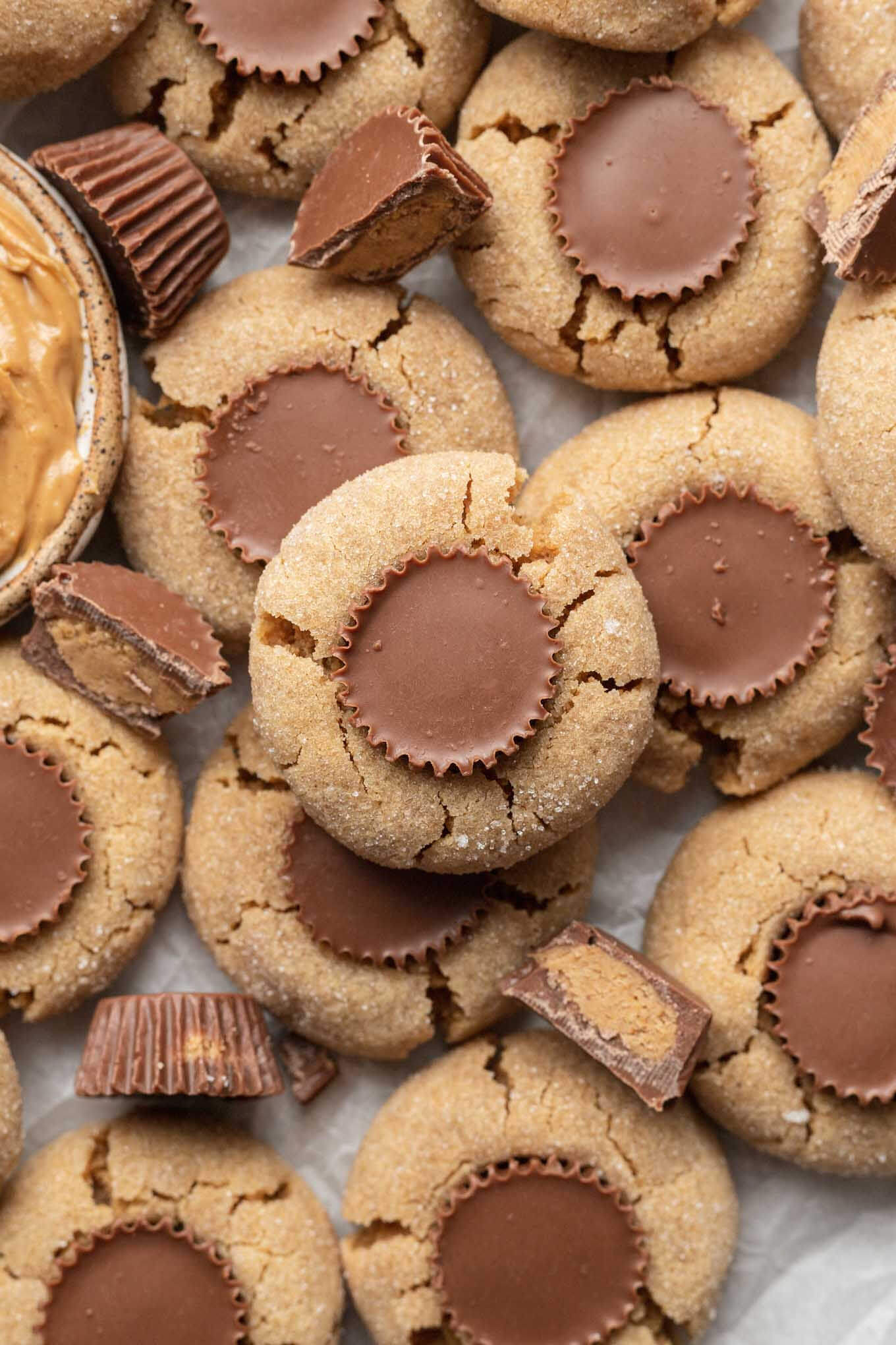 An overhead view of Reese's peanut butter cup cookies overlapping each other. 