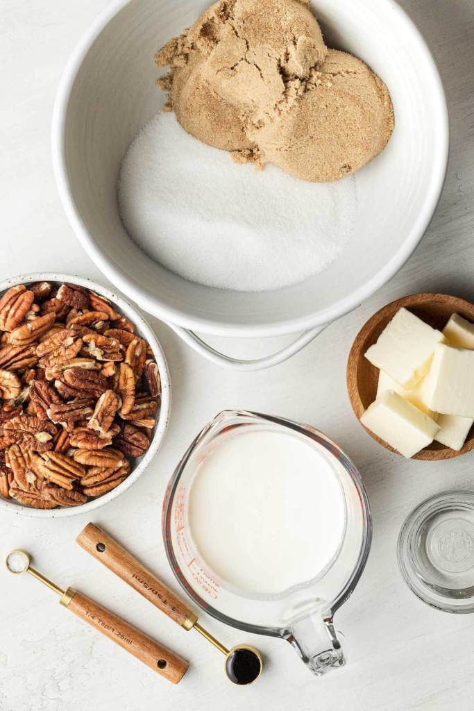 An overhead view of the ingredients needed to make pecan pralines. 