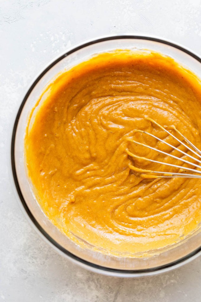 The finished batter mixed together in a glass mixing bowl.