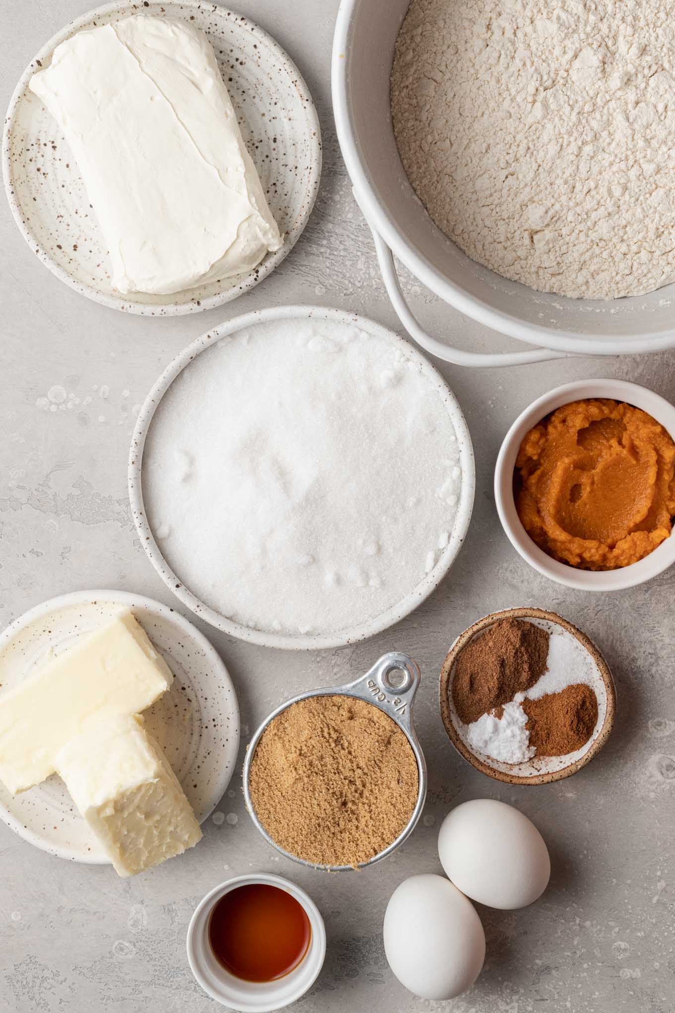 An overhead view of the ingredients needed to make pumpkin cream cheese cookies. 