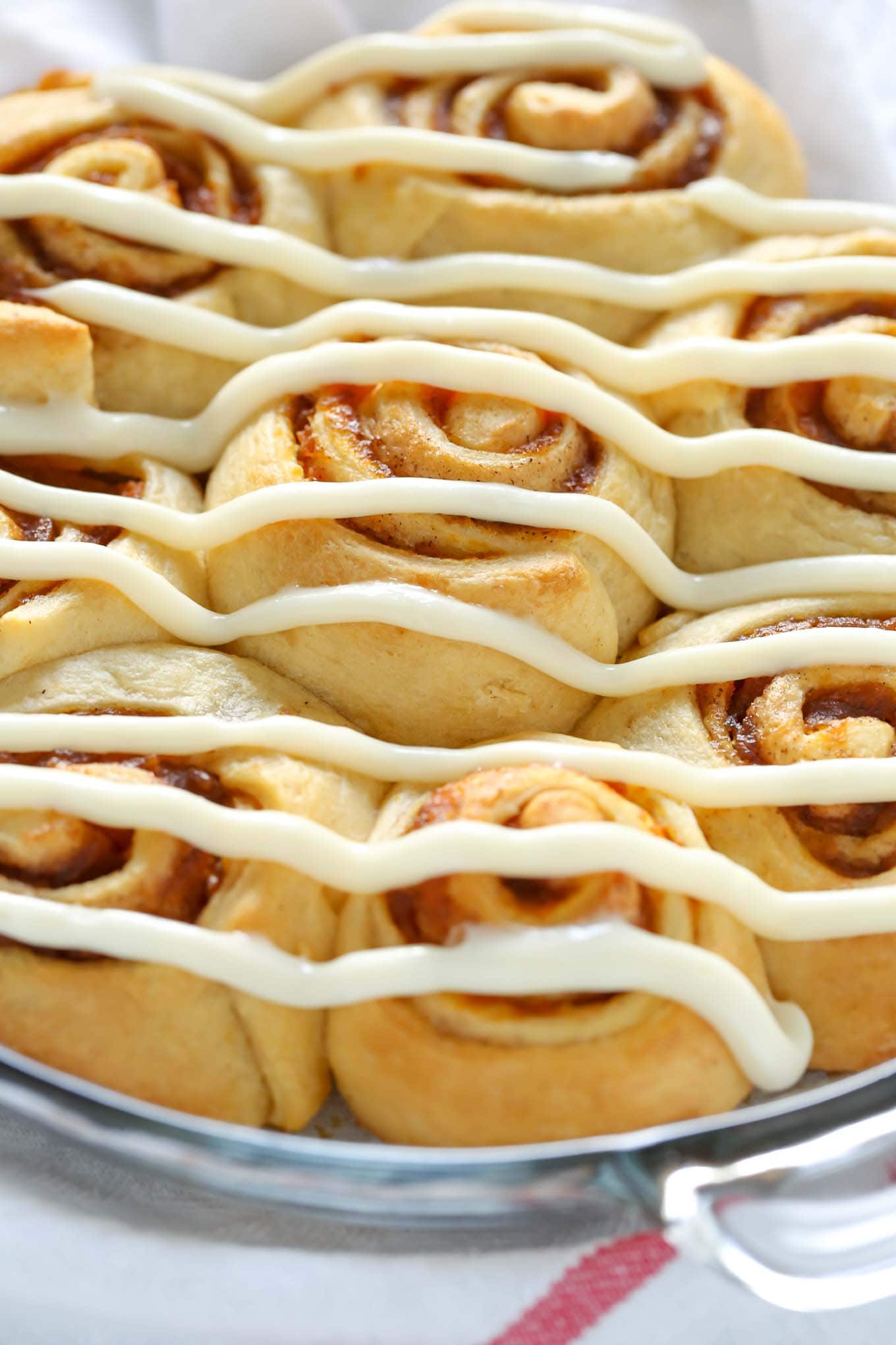 A pan of iced crescent roll cinnamon rolls. 