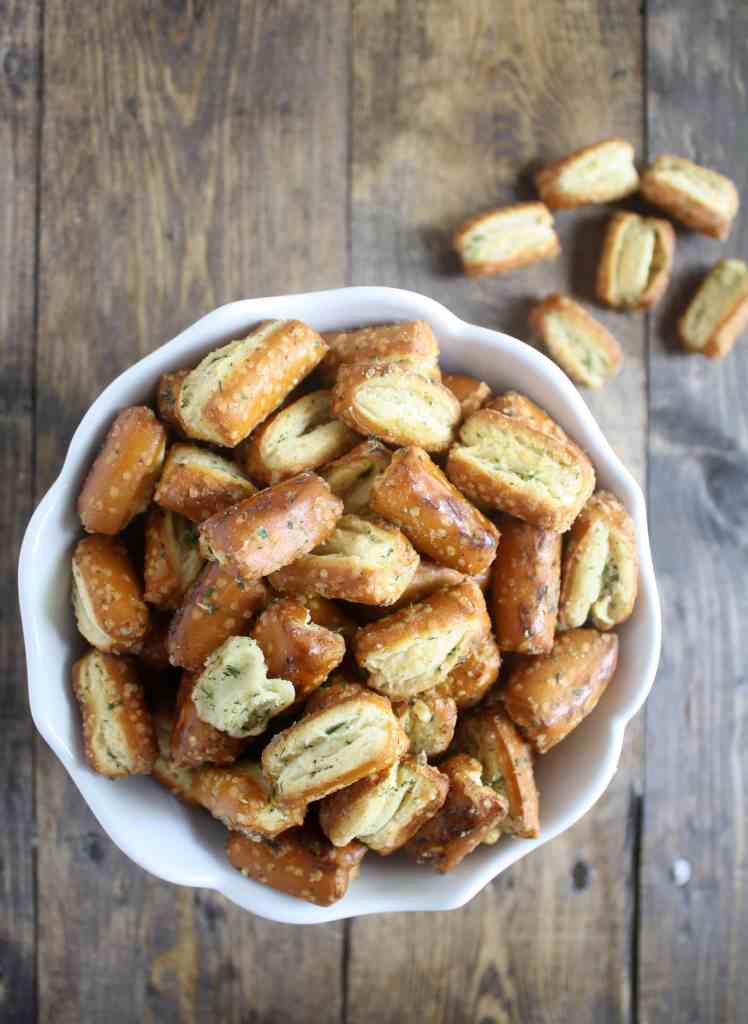 Overhead view of ranch pretzels in a white bowl. 