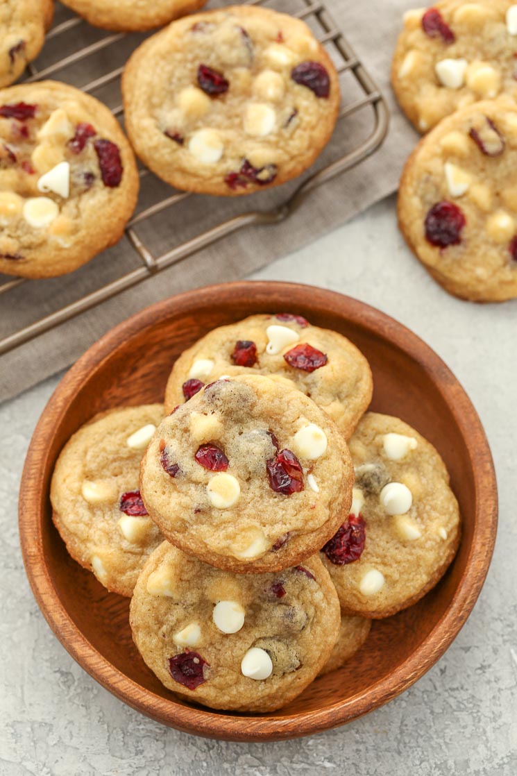 These White Chocolate Cranberry Cookies are incredibly thick, soft, chewy, and full of white chocolate chips and dried cranberries. Perfect for your holiday cookie tray!