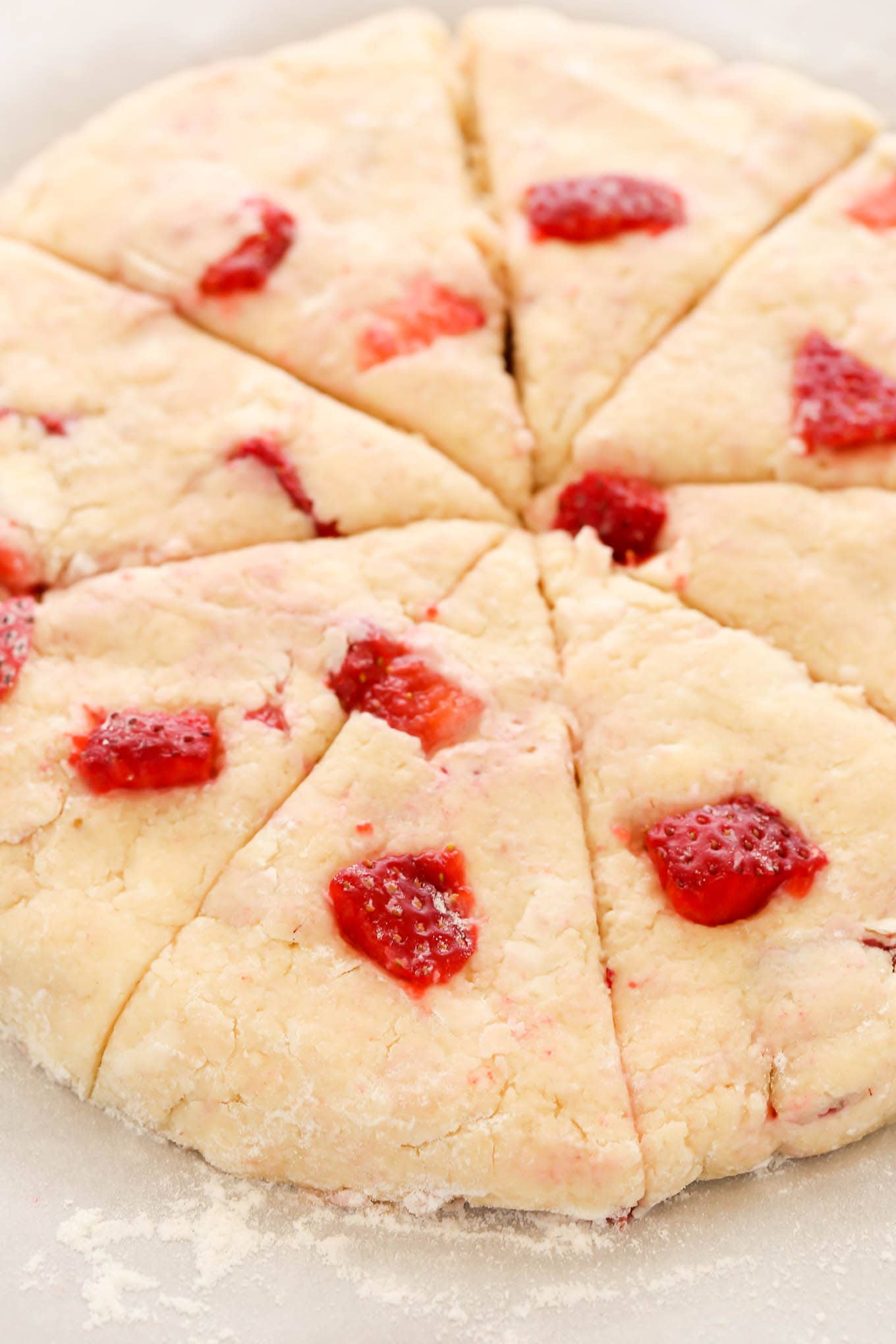 Strawberry scones that have been shaped and cut. 