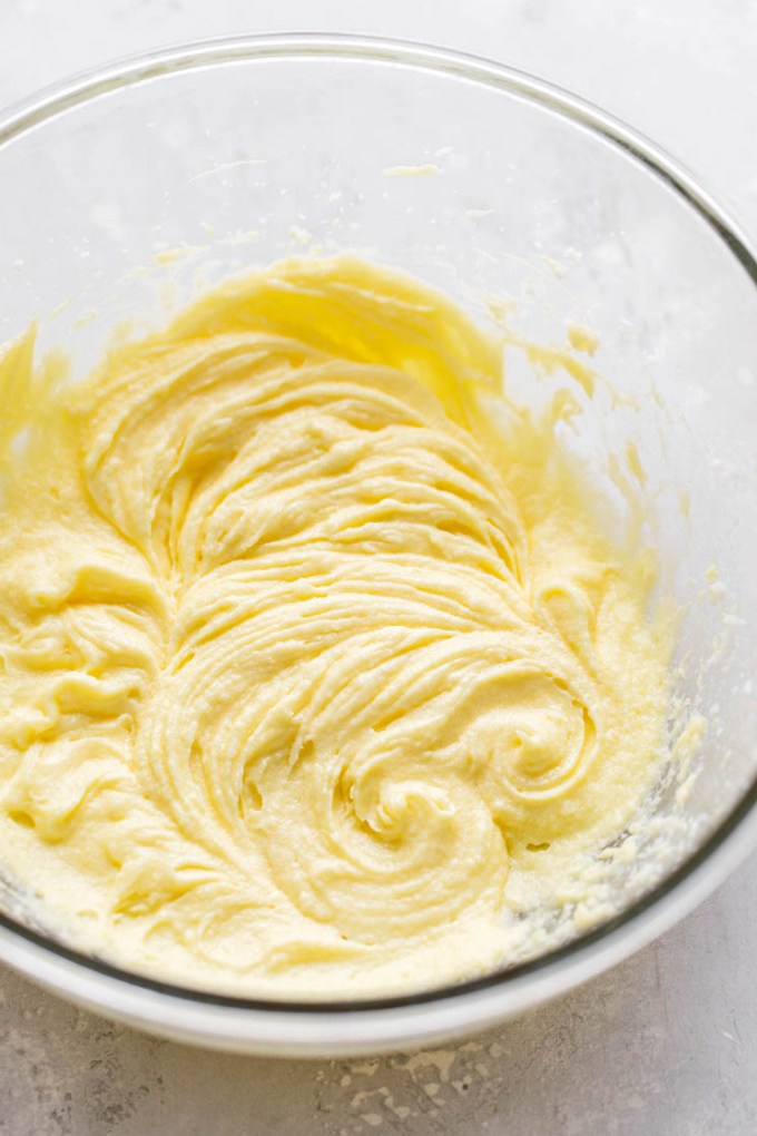 A glass bowl of cupcake batter.